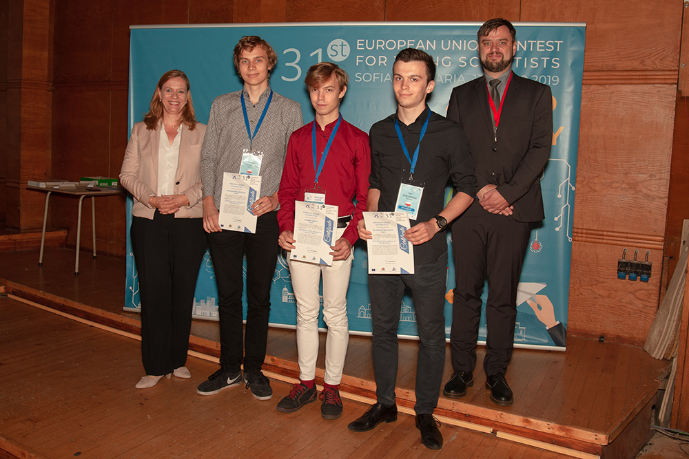 The three winners of the CERN Special Prize, together with Charlotte Warakaulle, Director for International Relations at CERN and Dr Attila Borics of the Hungarian Academy of Sciences, who was President of the Jury.